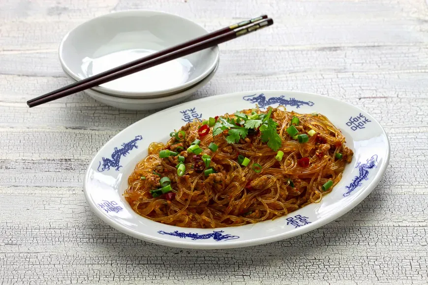 spicy stir fry vermicelli with minced pork, classic Sichuan dish in chinese cuisine called " Ants climbing a tree "